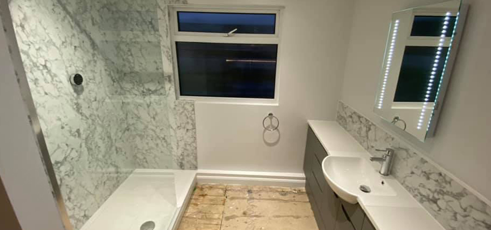 Nuance panels in Marmo Bianco fitted by G D Evans Interiors 